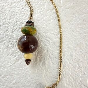 Elegant Gold Tone Choker necklace.